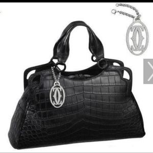 New with tags Cartier purse from Paris